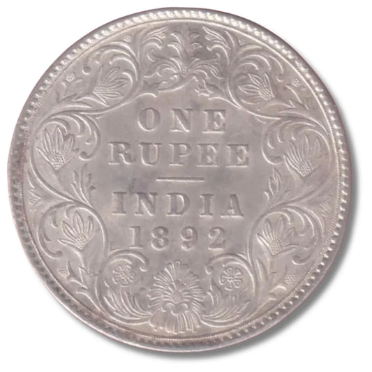 Antique 1892 British India one rupee silver coin with floral engravings
