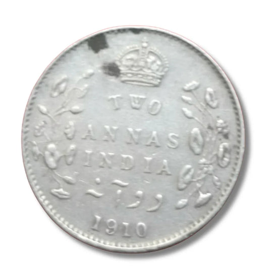 1910 British India two annas silver coin with crown and floral design, collectible currency