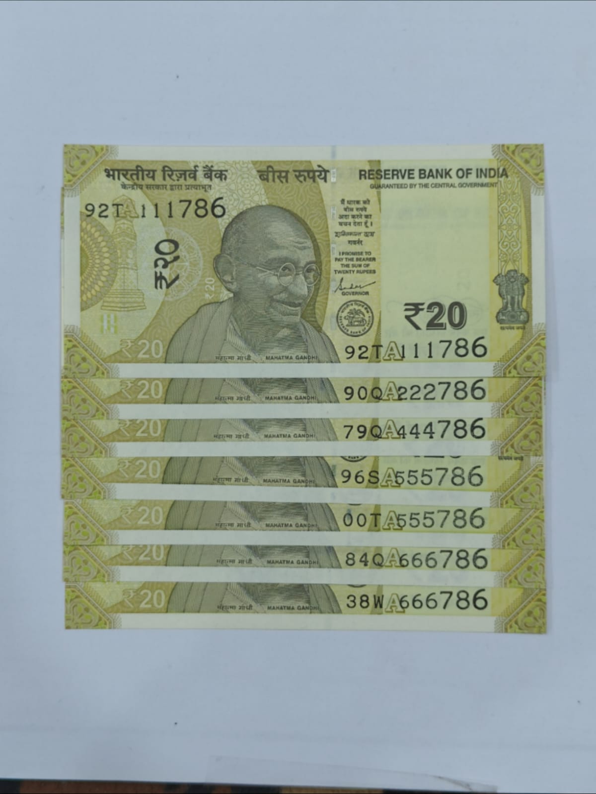 Rs 20 Note solid number starting ending 786 each note 300 unc condition