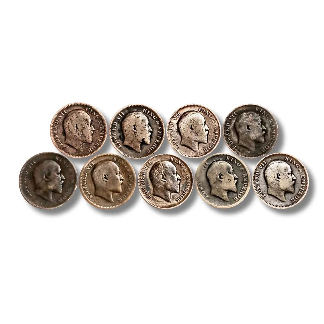 Set of ten vintage Edward VII collectible British India coins arranged on white background