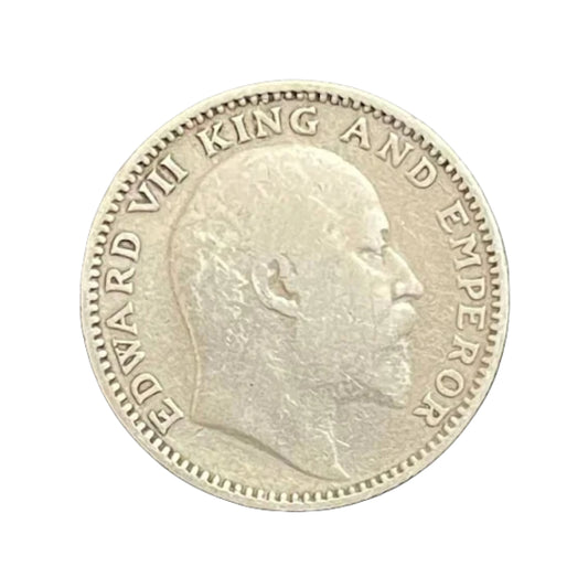 1910 Half Rupee British India silver coin featuring Edward VII portrait and floral wreath reverse design.