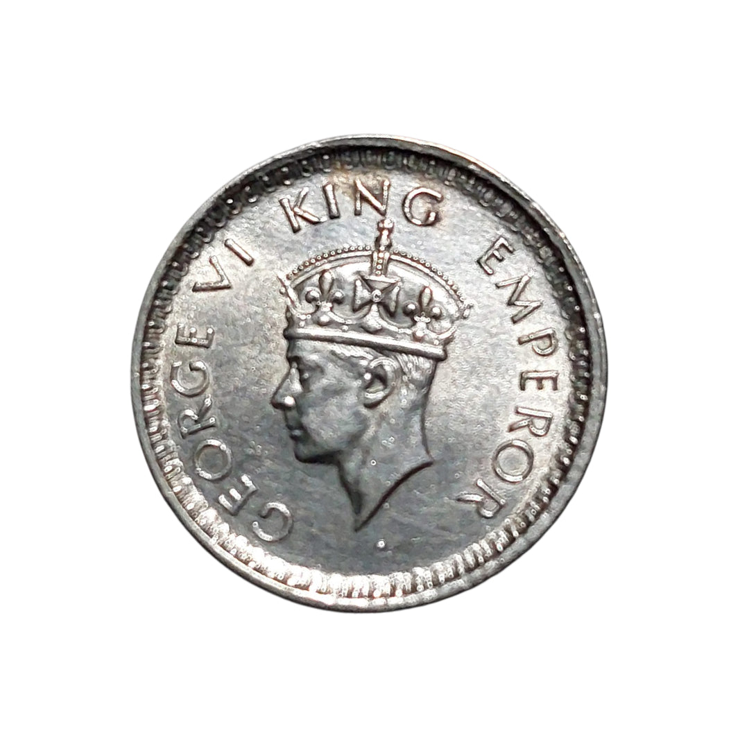 1942 Half Rupee British India silver coin featuring King George VI portrait and floral wreath reverse design.