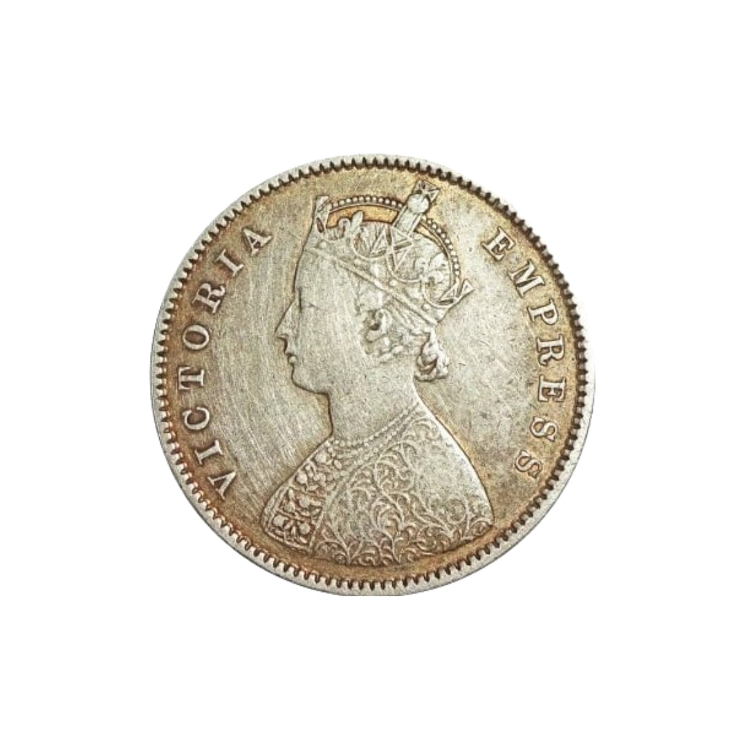 1899 half rupee British India silver coin featuring Queen Victoria Empress and floral wreath reverse design.