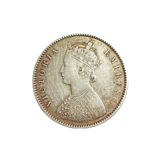 1899 half rupee British India silver coin featuring Queen Victoria Empress and floral wreath reverse design.