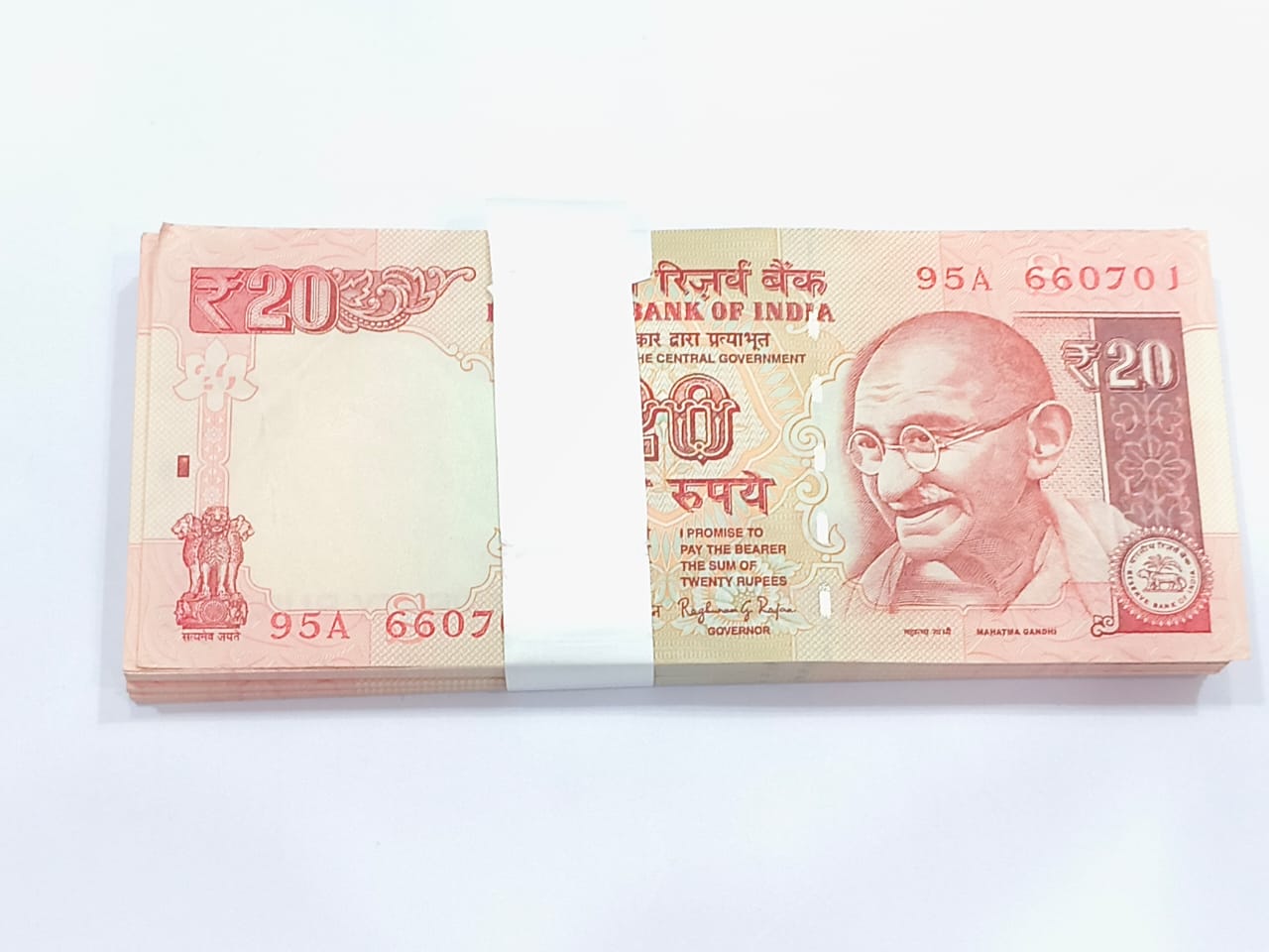 Rare ₹20 note packet with serial number 660701, Raghuram Rajan signed 100 UNC notes full bundle