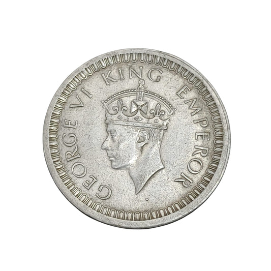 1942 India one rupee silver coin featuring King George VI with floral wreath reverse design, rare British India collectible.