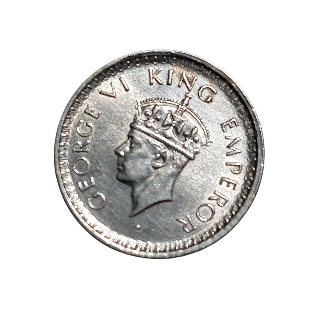 Rare 1943 India one rupee nickel coin featuring King George VI with floral wreath reverse design, collectible British India wartime coin.