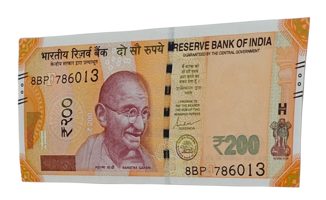 Rs 200 note with serial 786013, Holy Bismillah number, signed by Shaktikanta Das in UNC condition.