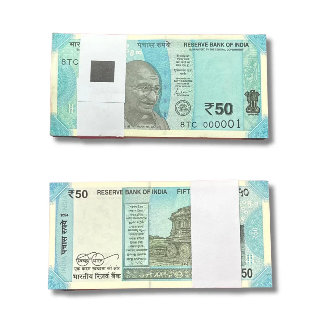 Bundle of new Indian 50 rupee notes with serial number 8TC 000001, collectible currency