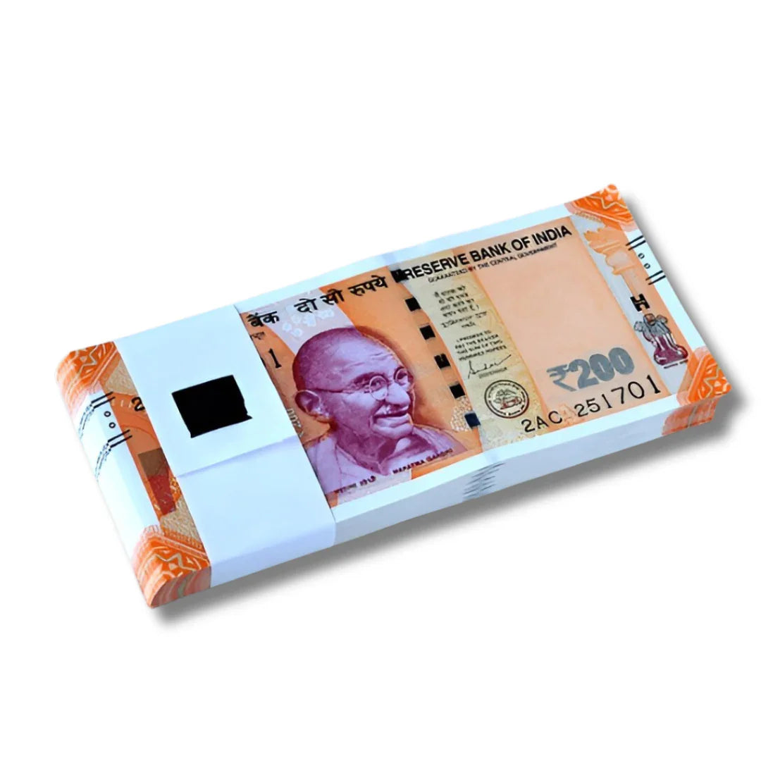 Bundle of Indian 200 rupee notes with Gandhi portrait, collectible currency on white background