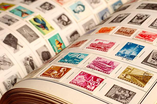 Album of rare collectible postage stamps in various colors and designs