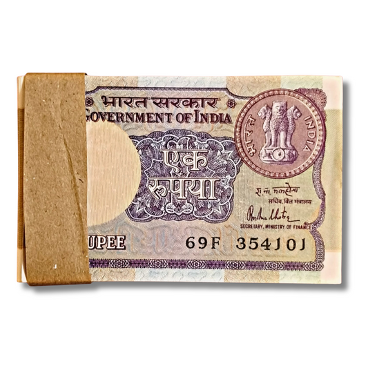 ₹1 big coin note, 1981 note packet, holy mala number, R N Malhotra ₹1 note, spiritual number note, old ₹1 currency India, UNC note packet, big coin format, religious currency

