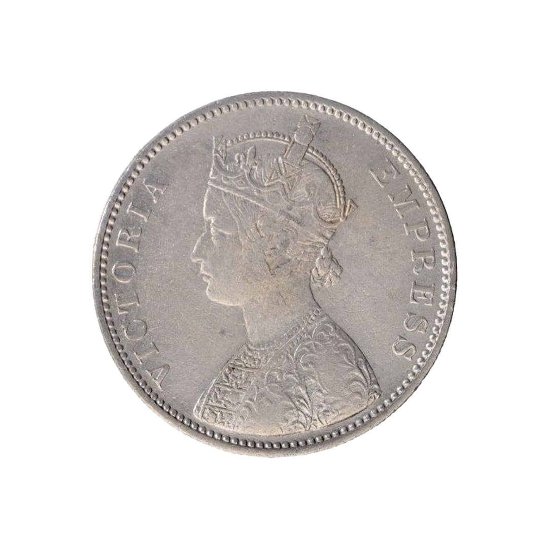 Rare 1877 India one rupee silver coin featuring Queen Victoria Empress with floral wreath reverse design, first empress issue British India coin.