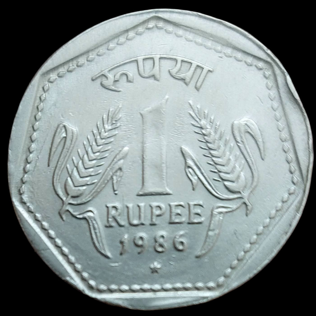 Rs 1 hyderabad mint year 1986 - Collection Bazzar