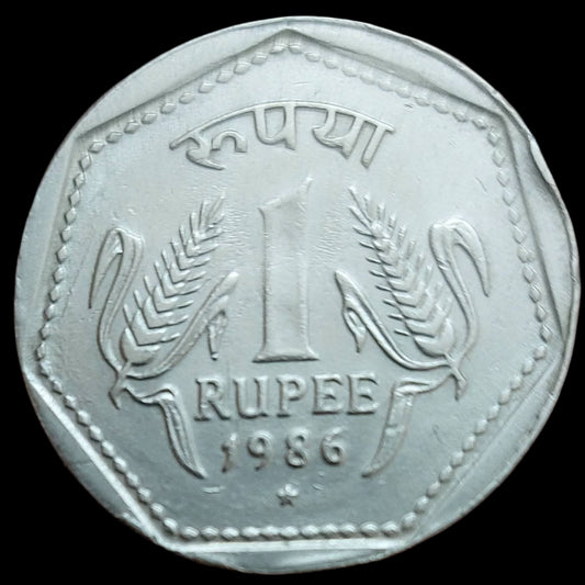 Rs 1 hyderabad mint year 1986 - Collection Bazzar
