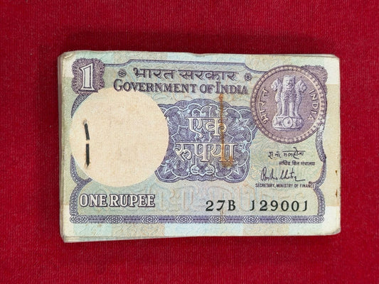 Rs 1 big coin serial  packet 129001 finance sec R N  malhotra - Collection Bazzar