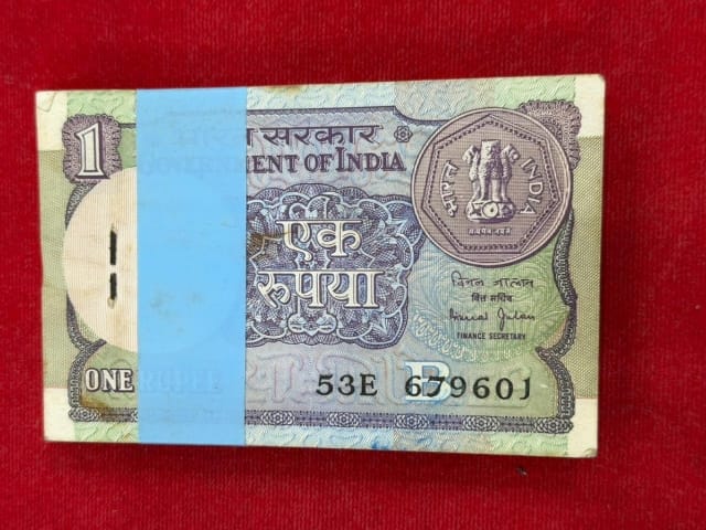 Rs 1 old serial packet 679601 with 679679 doubling number Bimal Jalan - Collection Bazzar
