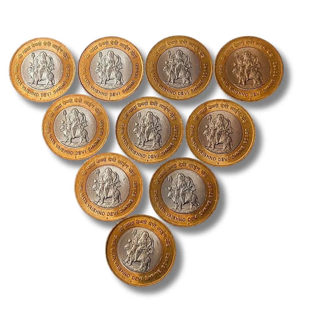 Set of ten 10 rupees Mata Vaishno Devi commemorative Noida Mint coins arranged on white background