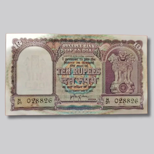 Vintage Indian 10 rupees currency note with Ashoka Pillar and serial number 028826