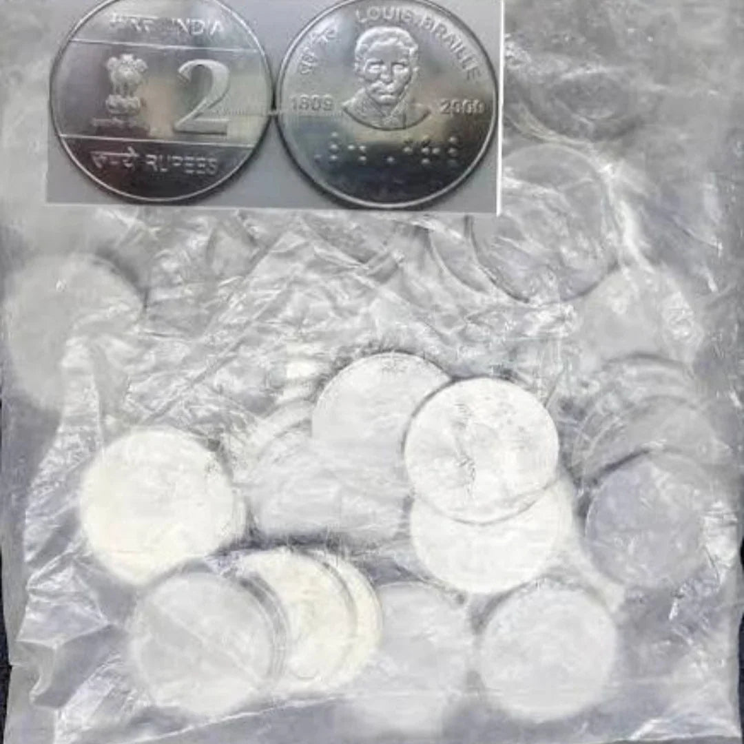 Packet of India Louis Braille 2 rupee stainless steel commemorative coins, 2009 issue