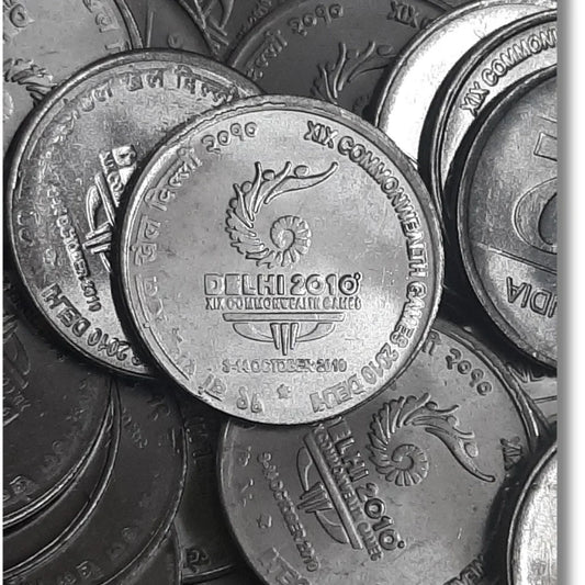 Rs 2 Delhi 2010 Commonwealth Games commemorative coin, collectible Indian coin pile