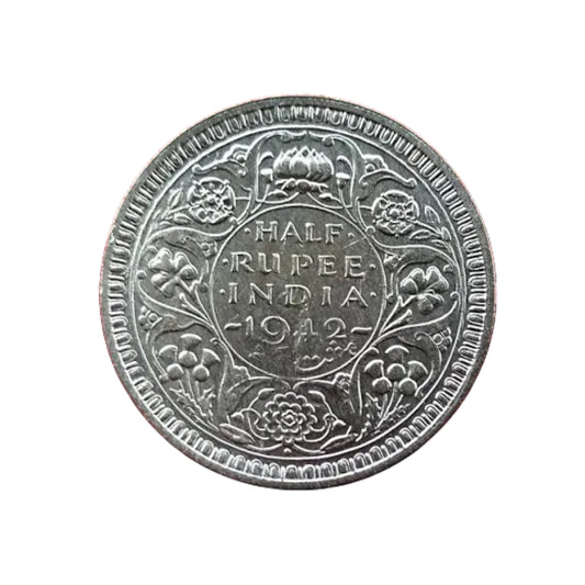 1942 Half Rupee British India silver coin featuring King George VI portrait and floral wreath reverse design.