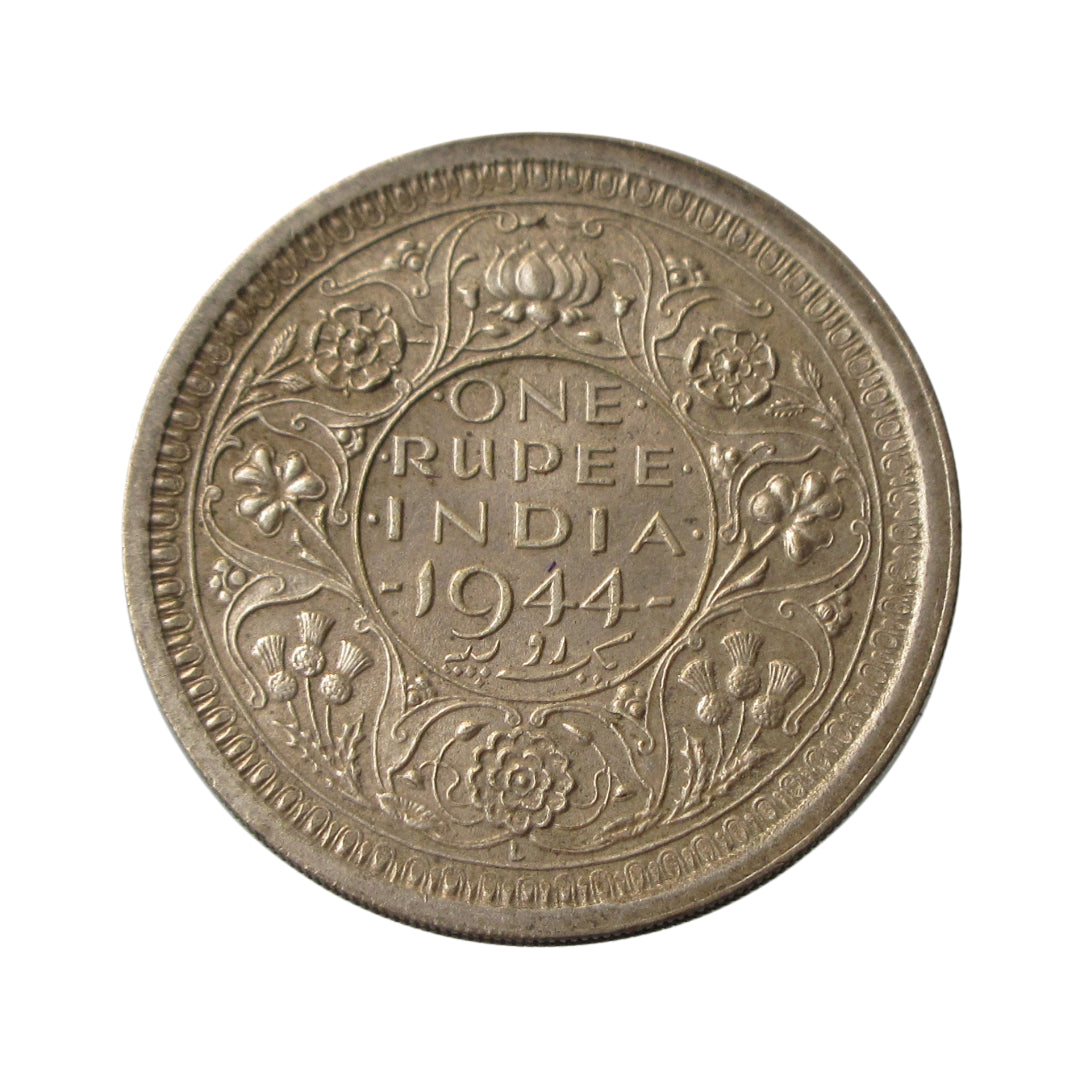 1944 One Rupee British India silver coin featuring George VI portrait and floral wreath reverse design.