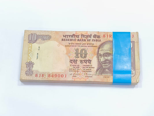 ₹10 note packet with serial number 849001, C. Rangarajan signed 100 UNC notes full bundle