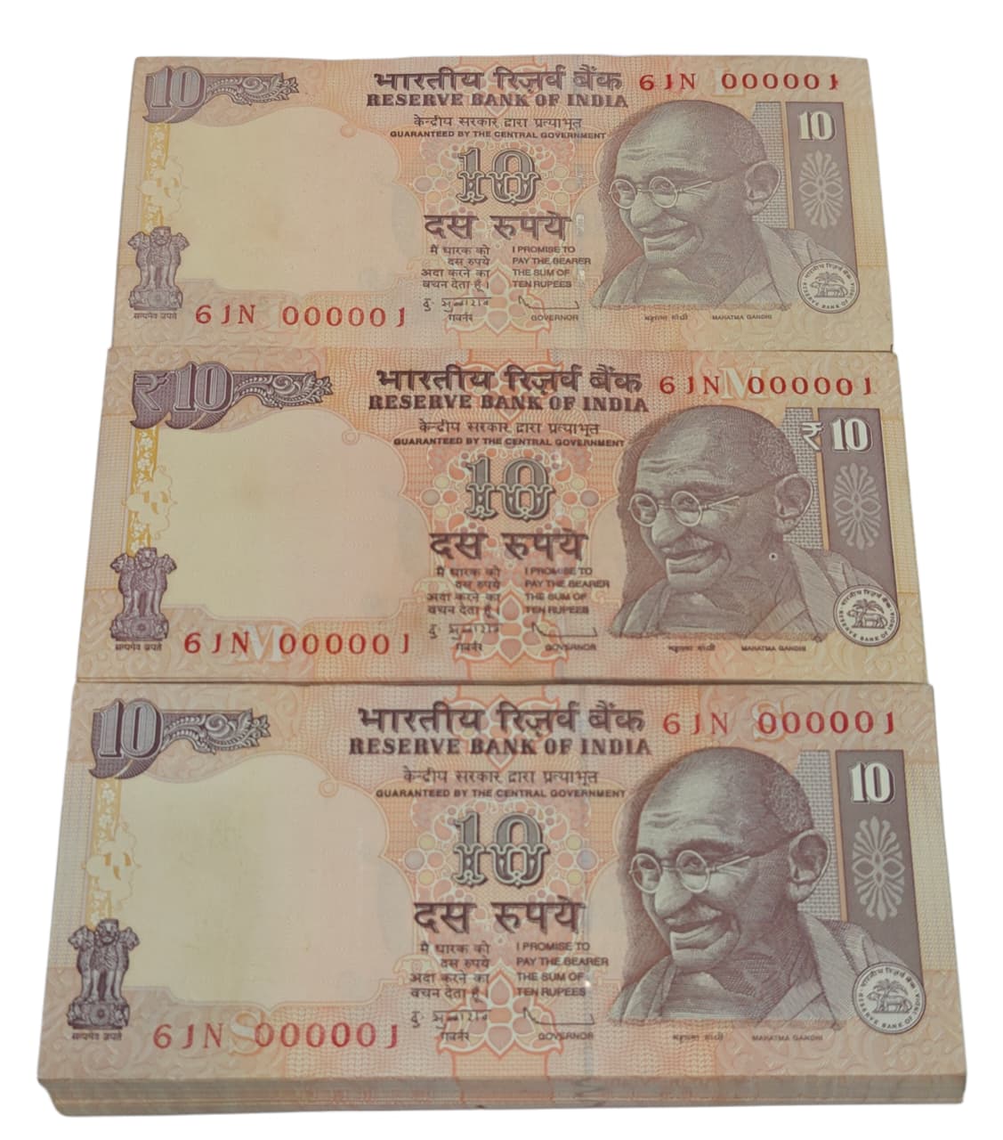 Rare Rs 10 note bundle with prefix 61N and serial number 000001, signed by RBI Governor D. Subbarao, extremely rare collectible in UNC condition.