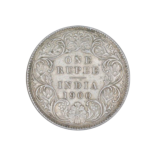 Rare 1900 one rupee India silver coin featuring Queen Victoria Empress with floral wreath reverse in collectible condition.