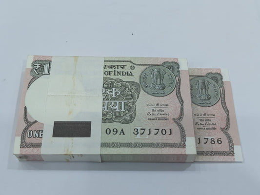 Rare Rs 1 serial packet 371701 ending 786 Holy Bismillah number in UNC condition, collectible Indian currency notes.