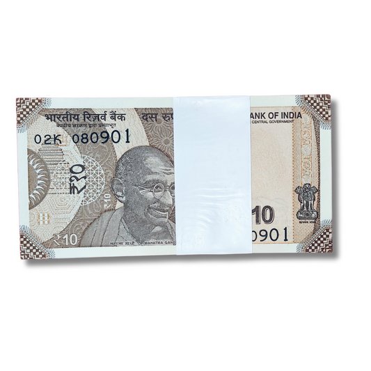 Rare Rs 10 note packet with birthday/anniversary date 08.09.2001, full bundle of 100 GEM UNC notes featuring Gandhi portrait and Konark Sun Temple design.