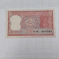 Rs 2 Note with serial 000786 signed by Manmohan Singh, featuring tiger design and Ashoka Pillar