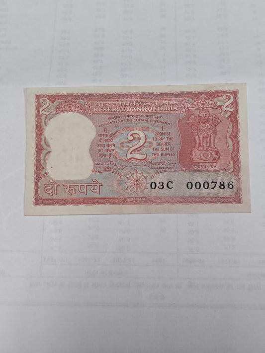 Rs 2 Note with serial 000786 signed by Manmohan Singh, featuring tiger design and Ashoka Pillar