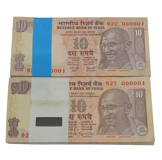 Rare Rs 10 note bundles with prefixes 92C and 92T, both serial number 000001, signed by RBI Governors Y. V. Reddy and Raghuram G. Rajan, 2 full bundles.
