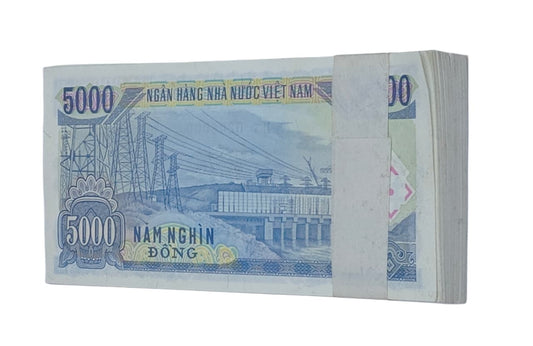 Vietnam 5000 Đồng old banknote bundle with Ho Chi Minh portrait and hydroelectric power dam design